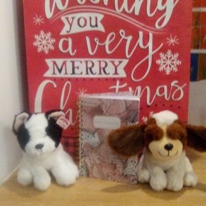 Notebook, Two small stuffed animals dogs.